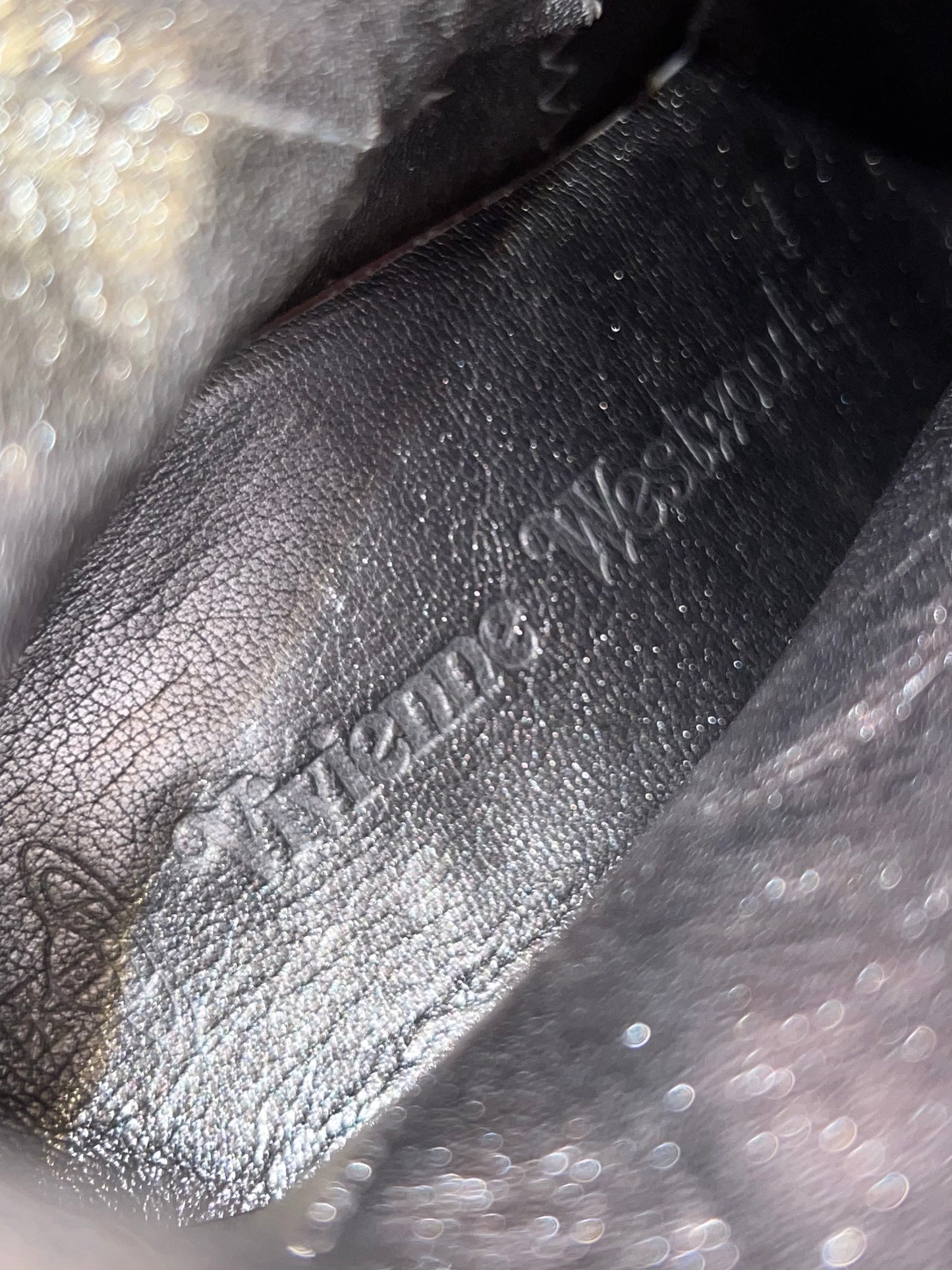 vivienne westwood metallic leather articulated “armor” boots, a/w 2010